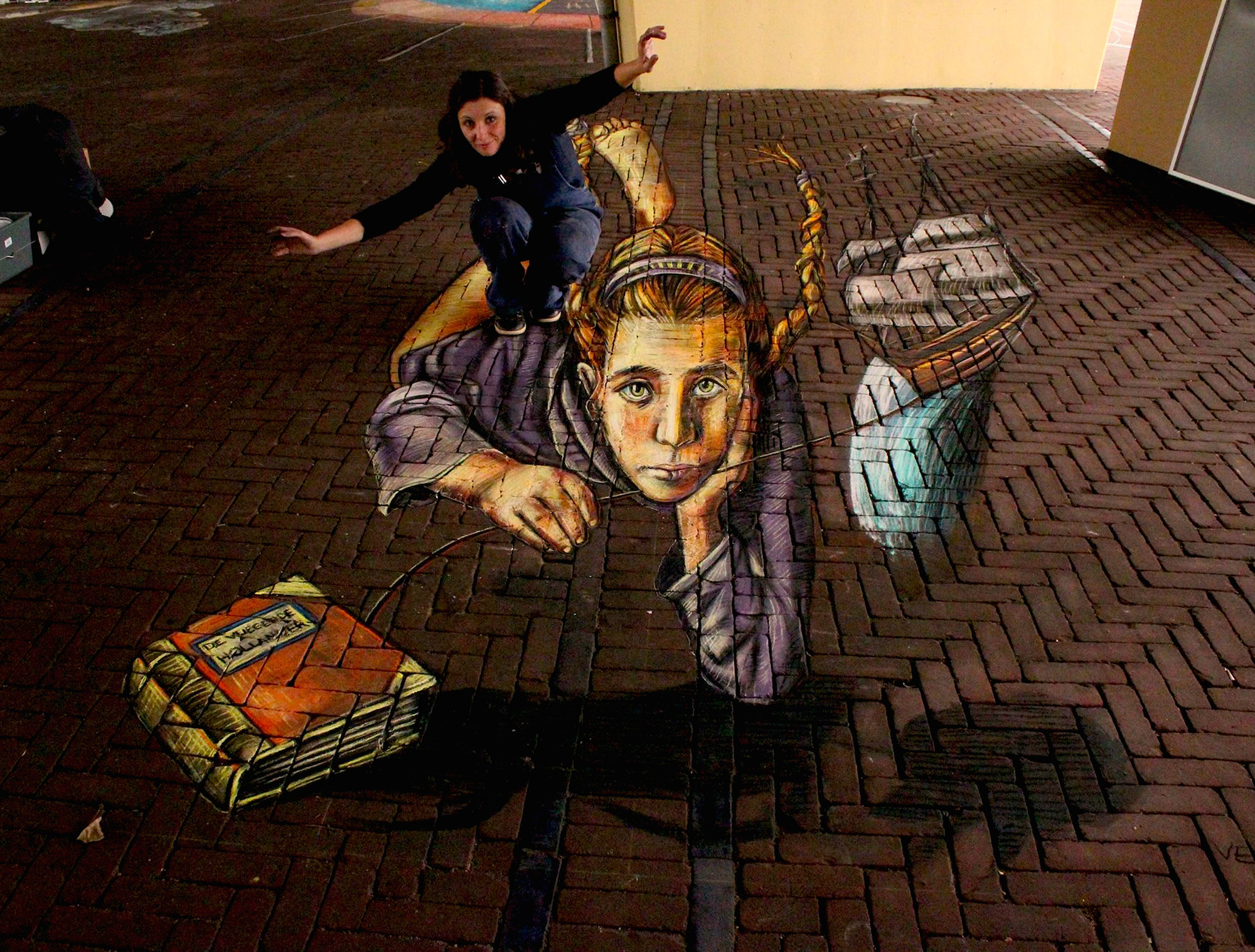 verabugatti streetart arteurbana illusioniottiche 3Dstreetart anamorfosi anamorfico anamorphic illusions urbanart madonnari3D pavementart 3Dstreetart 3Dstreetpainting environment thereisnotplanetb floatingillusion flyingillusion books denhaag streetartbelgium